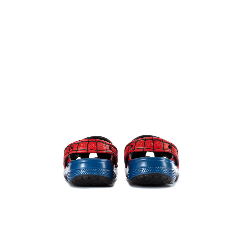 Kids red clogs, rear view with blue textured heel and spiderweb print