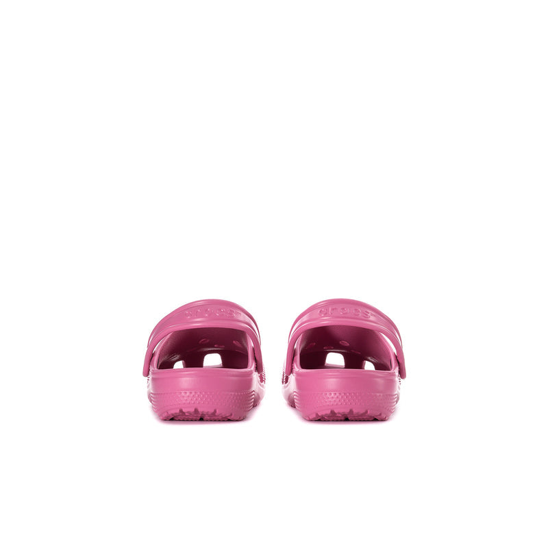 Pink kids' clogs from back with heel openings and molded sole