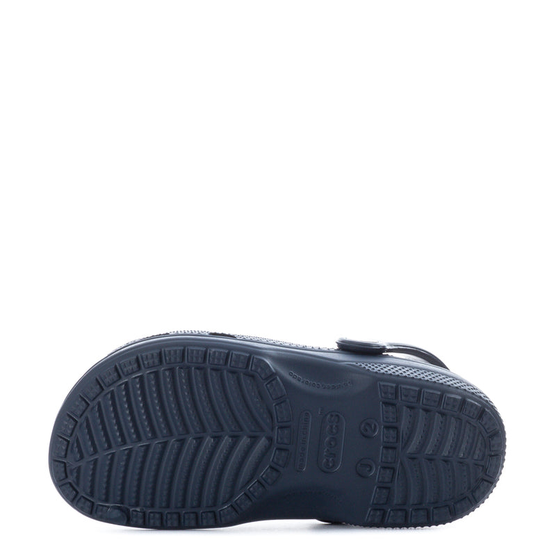 Kids' navy clog with textured outsole tread and grip pattern