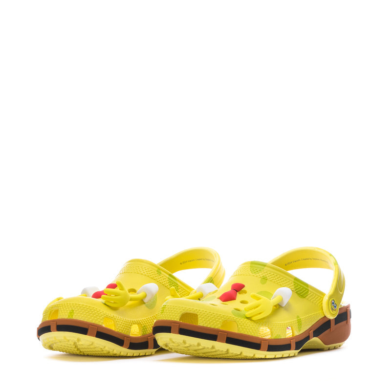 Pair of men's yellow clogs with cartoon detailing and openwork upper, black and orange platform