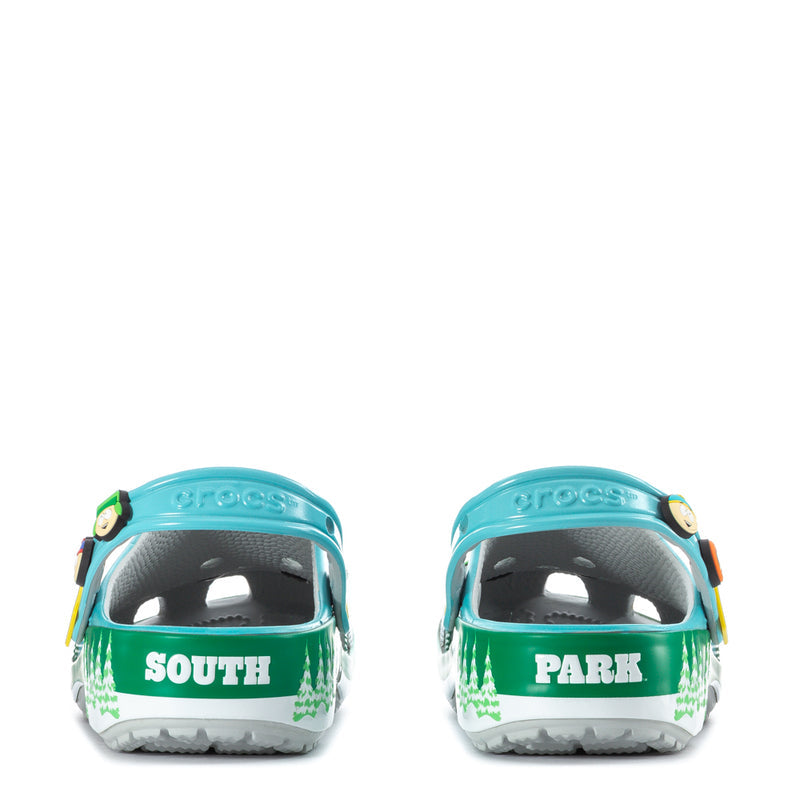 Men's clog heels with large 'SOUTH' and 'PARK' lettering on green.