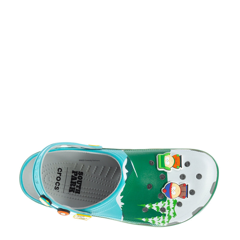 Men's clog top view with green upper, white interior, and character patches.