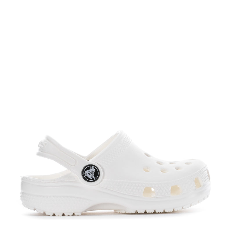 White toddler clog with round vent holes and side Crocs emblem
