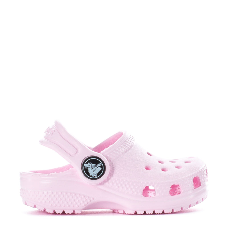 Pink toddler clog with adjustable strap and ventilation holes, textured sole