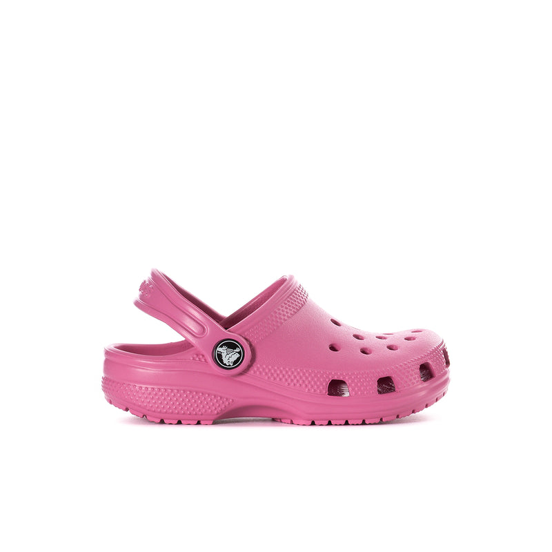 Toddler classic clog in quiet rose pink, side view with ventilation holes and logo emblem