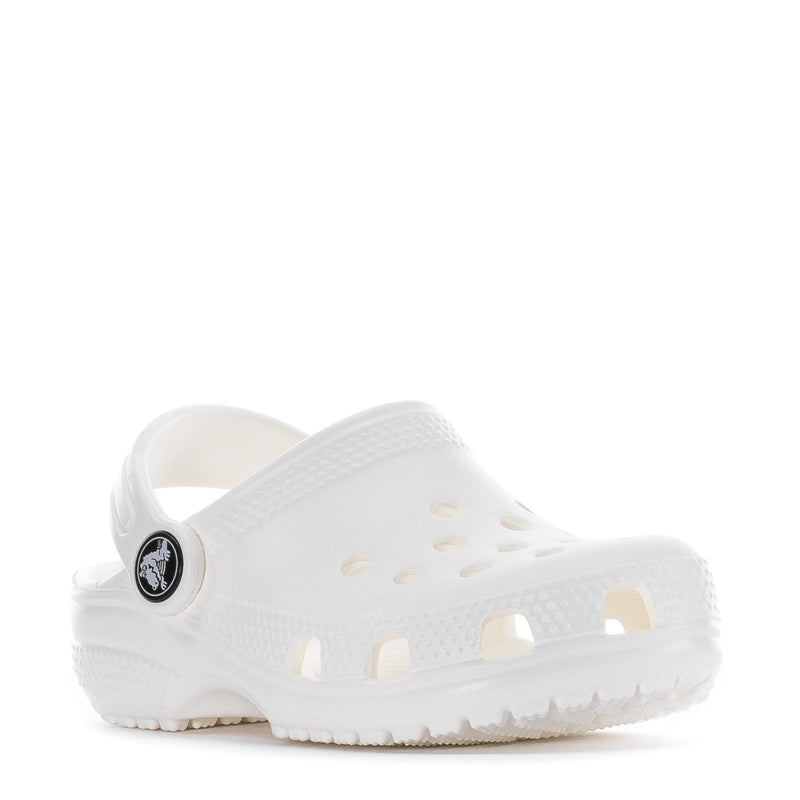 White toddler clog, side view, slip-on with round vent holes