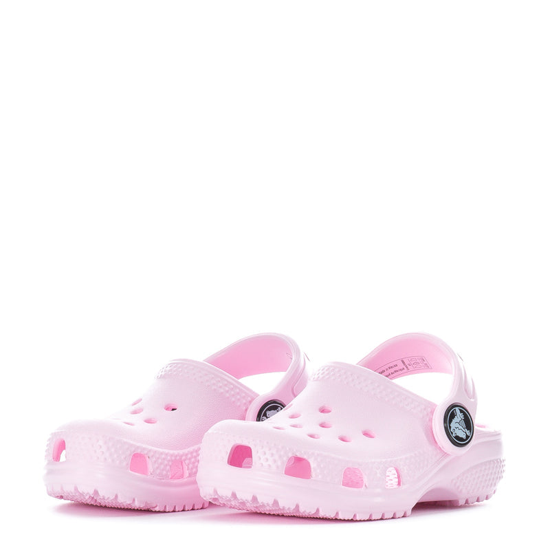 Pair of pink toddler clogs with perforated uppers and adjustable heel strap