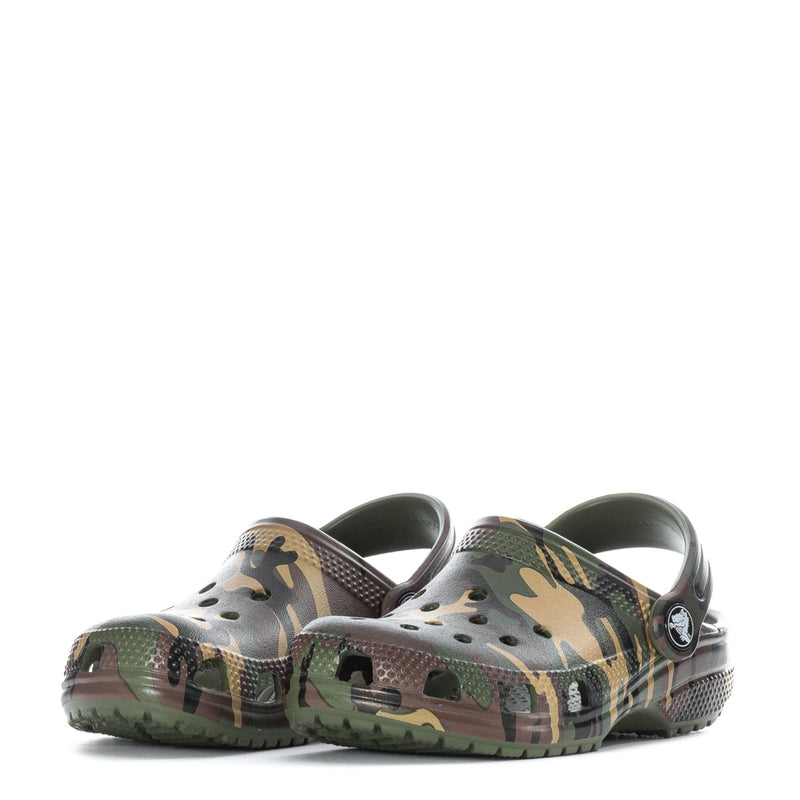 Toddler camo clogs with perforated toe and heel strap; camo print on the upper