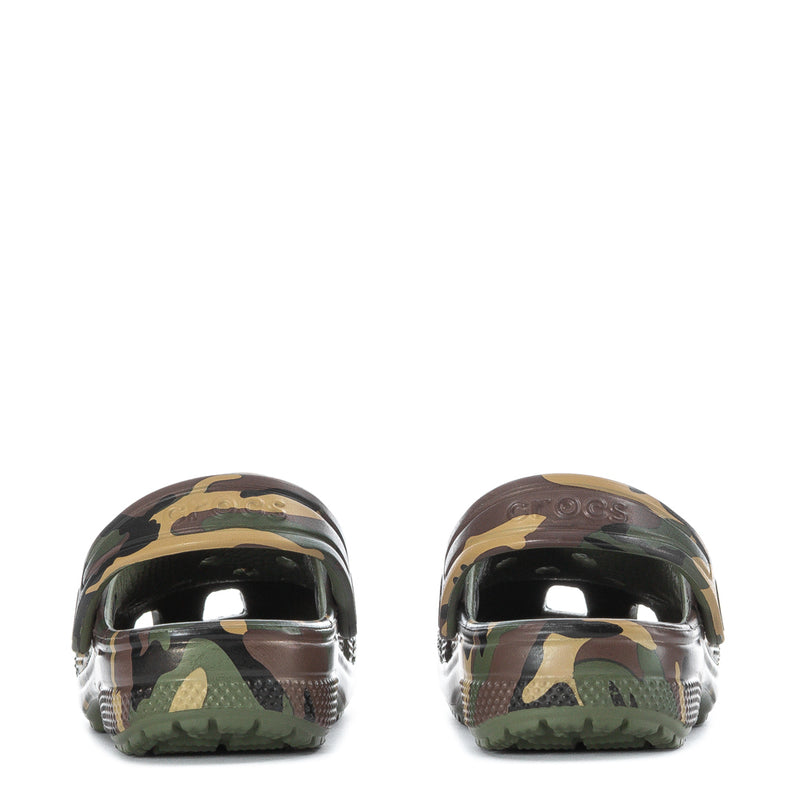 Toddler camo clogs viewed from back, showing glossy heel caps and adjustable strap