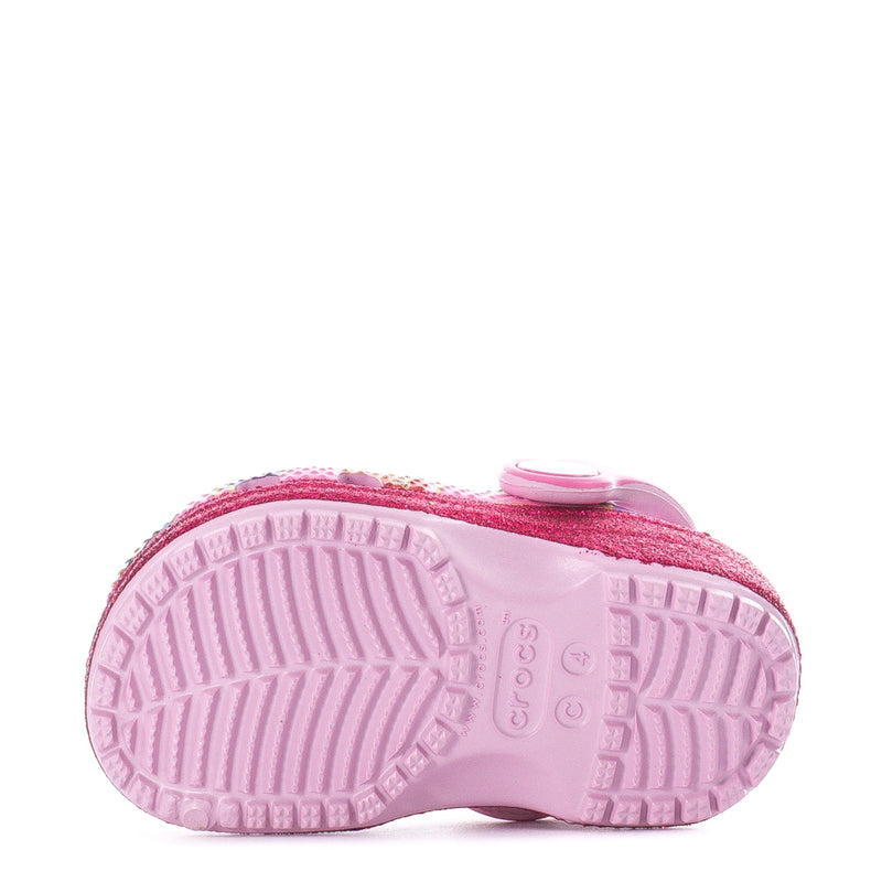 Toddler pink clog outsole tread view with heel strap and sidewall