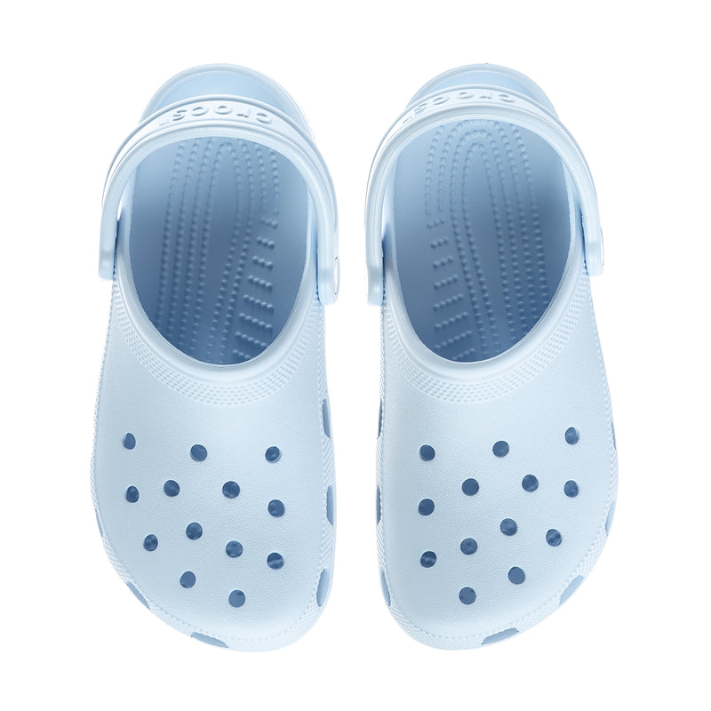 Pair of blue slip-on clogs with perforated panels and cushioned footbeds