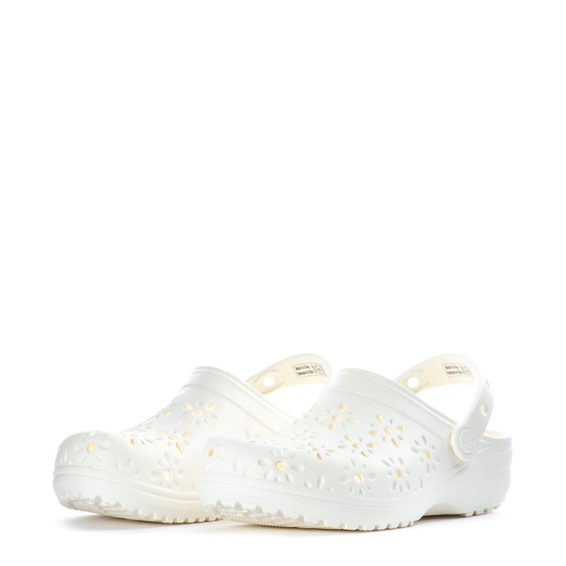Women's white clog with front floral cutouts and adjustable side strap