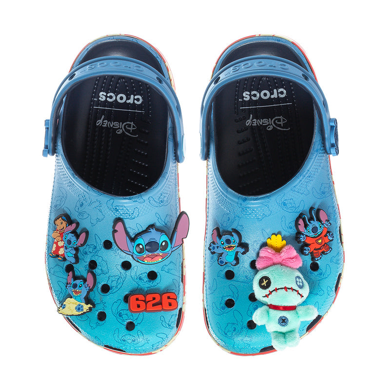 Women's blue cartoon clogs with black interior and character graphics on uppers