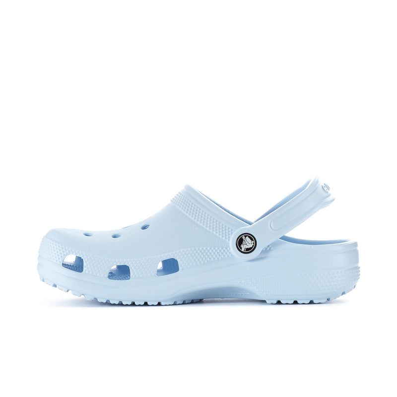 Women's blue clog with perforations, round logo on strap, chunky sole tread