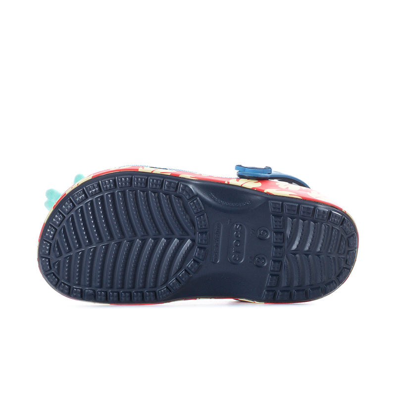 Women's blue clog outsole with textured tread and red edge