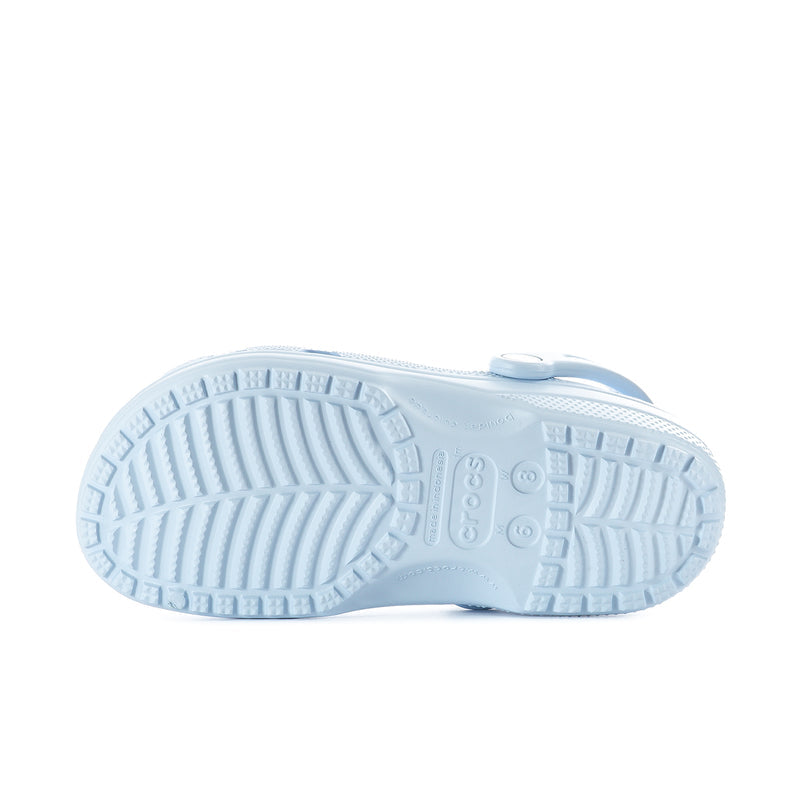 Blue clog outsole with textured traction grooves and molded tread pattern