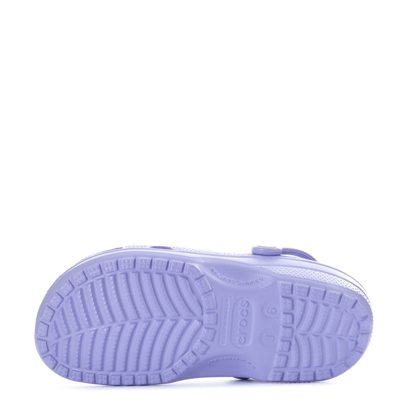 Youth clog sandals, light purple, visible tread outsole with embossed grip pattern.