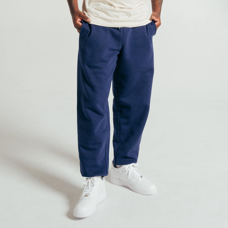 Men's medieval blue fleece sweatpants with drawstring waist and ribbed ankle cuffs