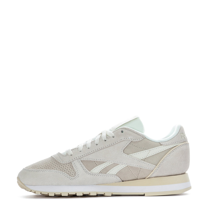 Mens leather sneakers, side view, light beige panels with white laces and mint accents