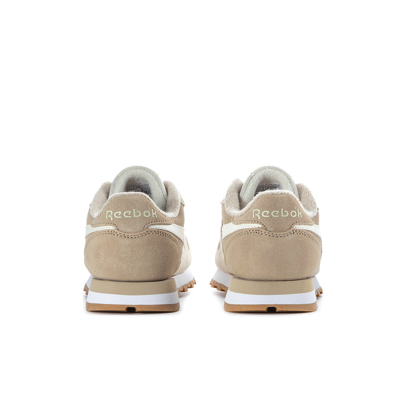Women's cream sneakers with tan heel tab and gum sole, rear branding