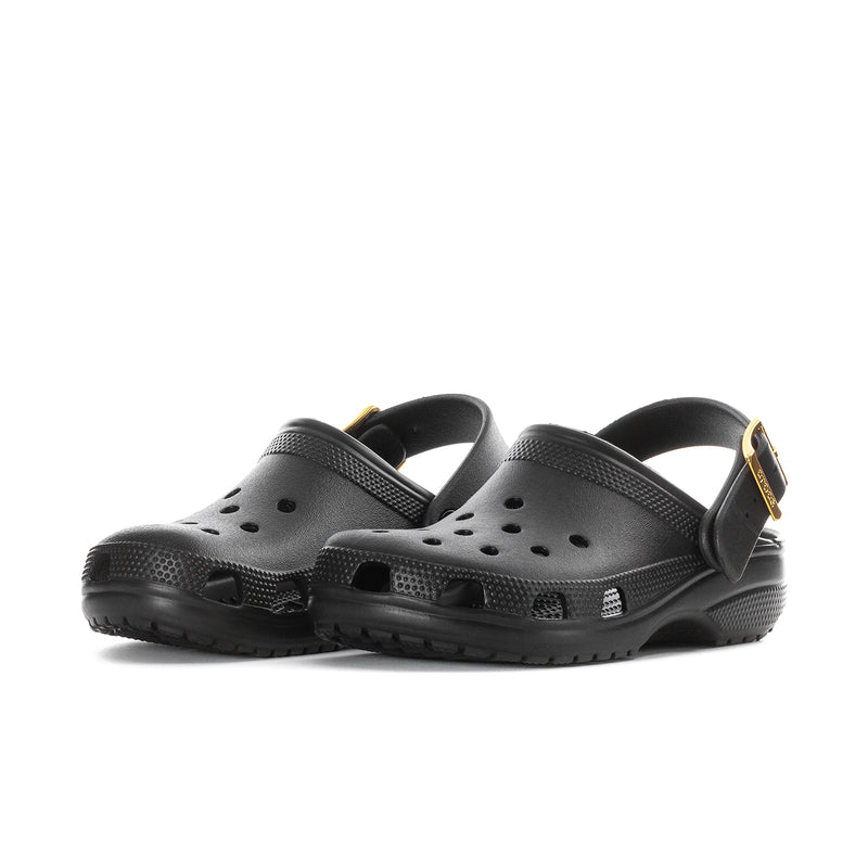 Women’s black clog with metallic buckle strap and perforated upper