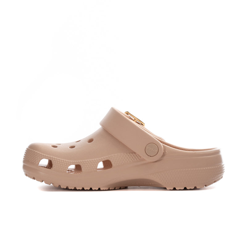 Blush women's clog side profile with metallic buckle and perforated upper