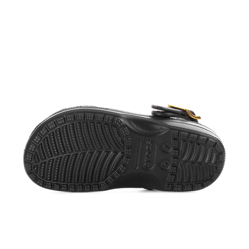 Black women's clog with metallic buckle strap and textured rubber outsole