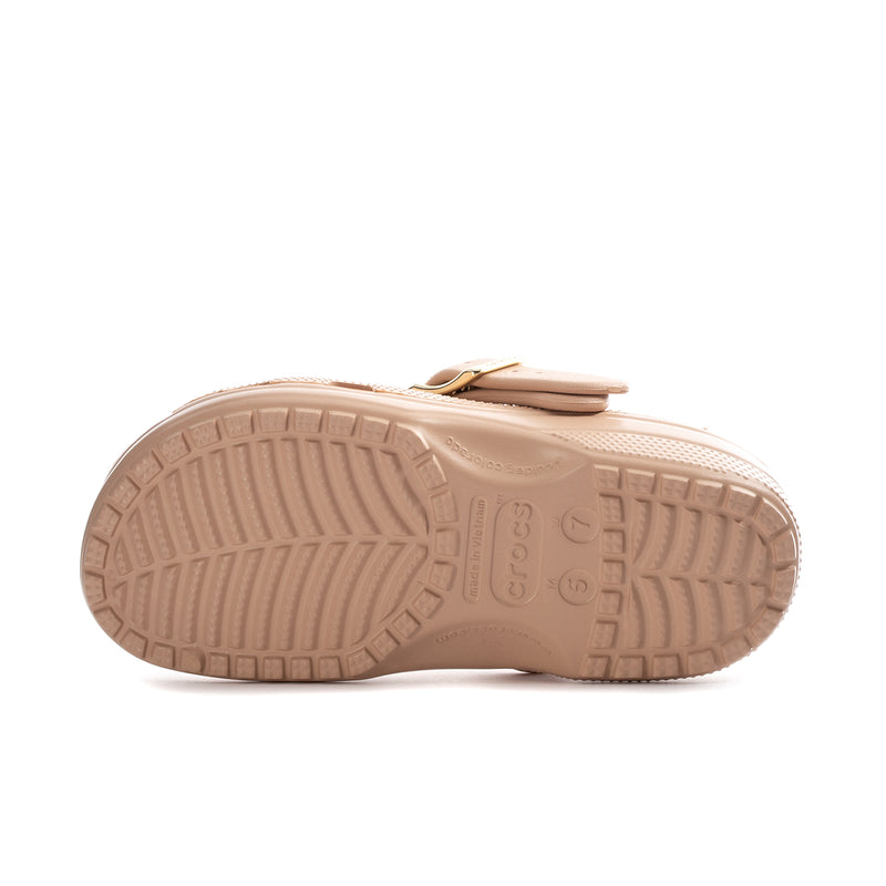 Blush clog outsole view with textured tread and molded traction pattern