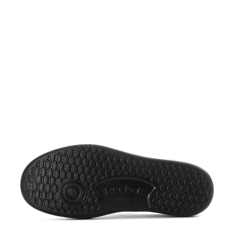Black kids sneaker outsole with textured tread and Reebok logo