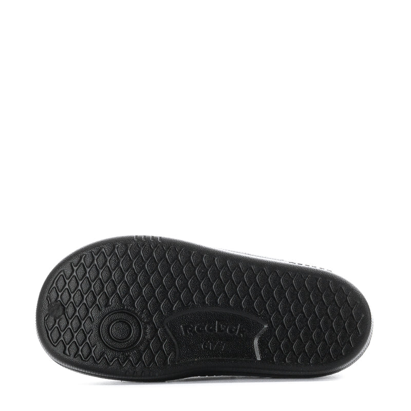 Black toddler sneaker outsole with textured rubber tread and logo mark