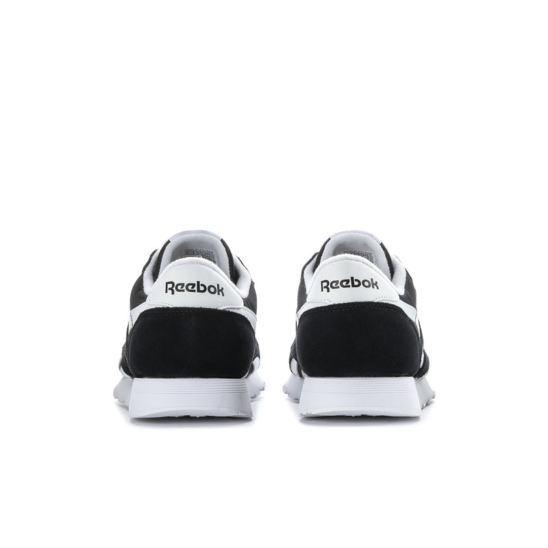 Men's black Reebok sneakers, rear view with white heel tab