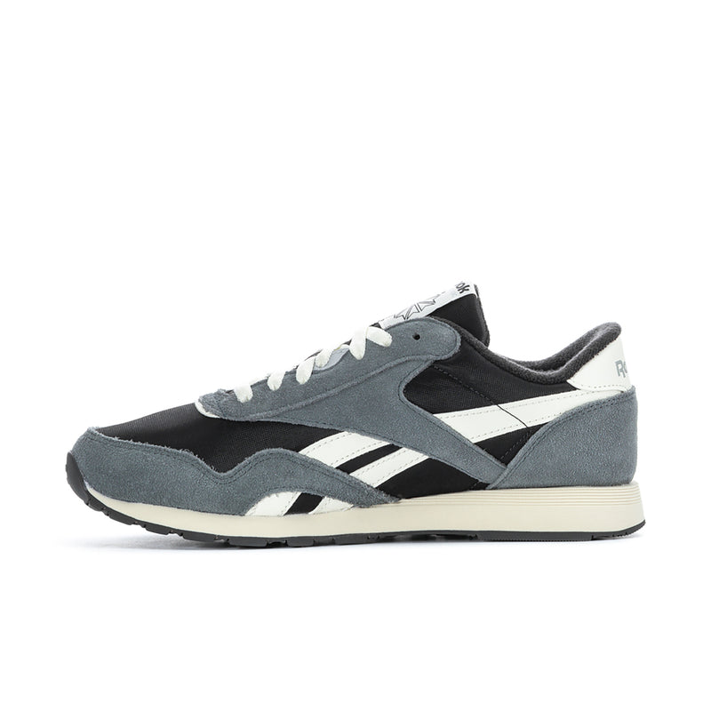 Men's nylon sneaker profile, black and gray with white stripe accents and lace-up.