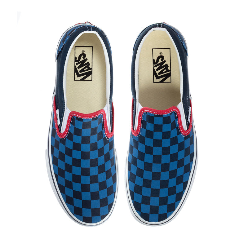 Pair of men's slip-on sneakers, blue checkered canvas with red trim and Vans logo.