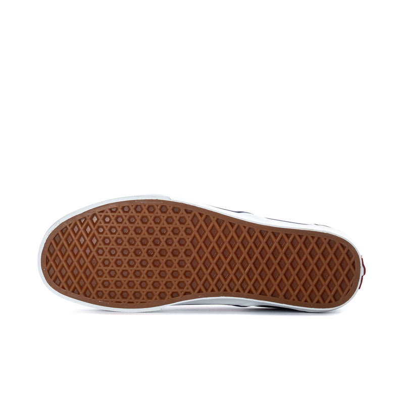 Rubber outsole for men's slip-on sneakers with brown traction tread.