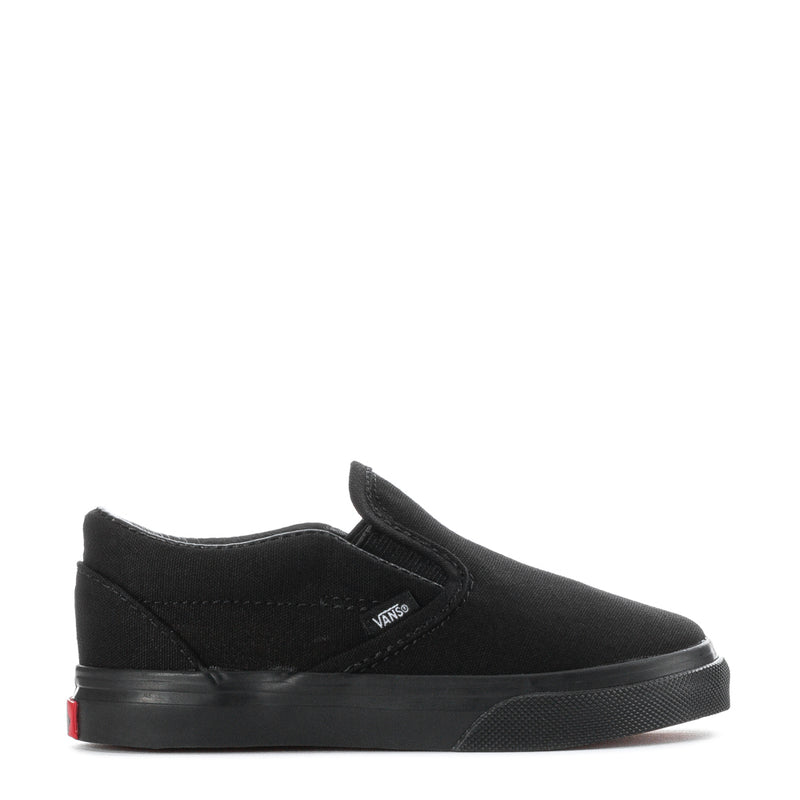 Black toddler slip-on sneakers with side logo and low-profile rubber sole