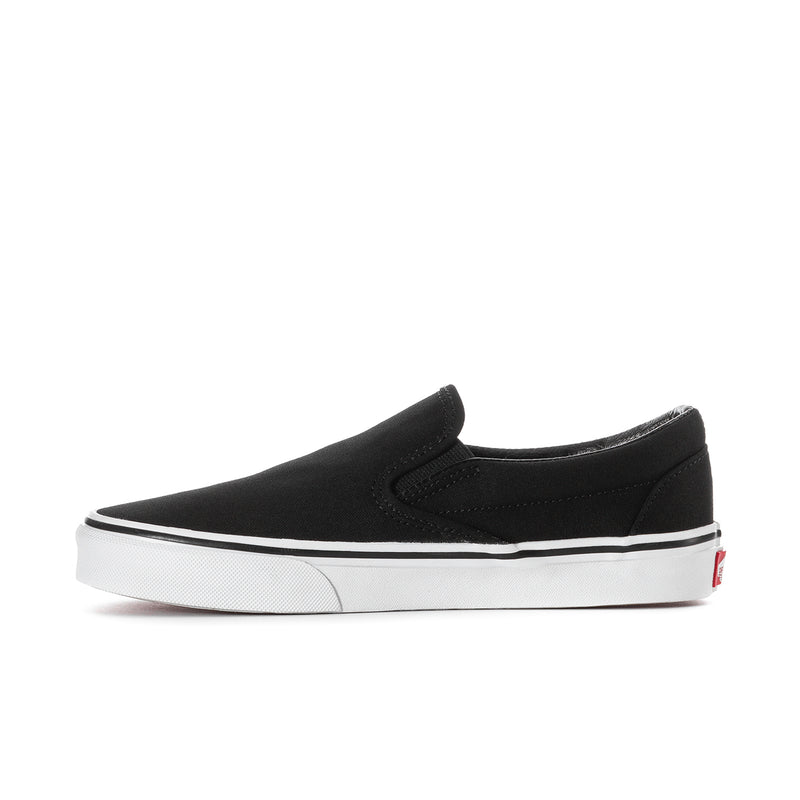 Black VANS slip-on sneakers, angled side view, smooth upper with white sole