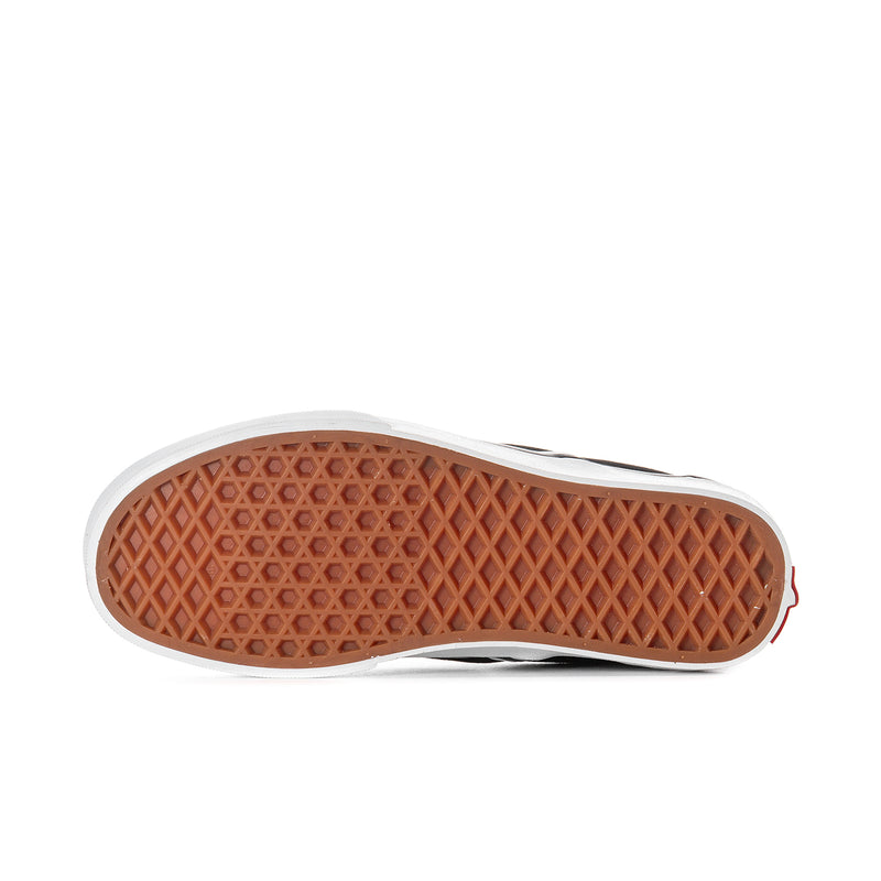 Black slip-on sneaker outsole with textured rubber tread