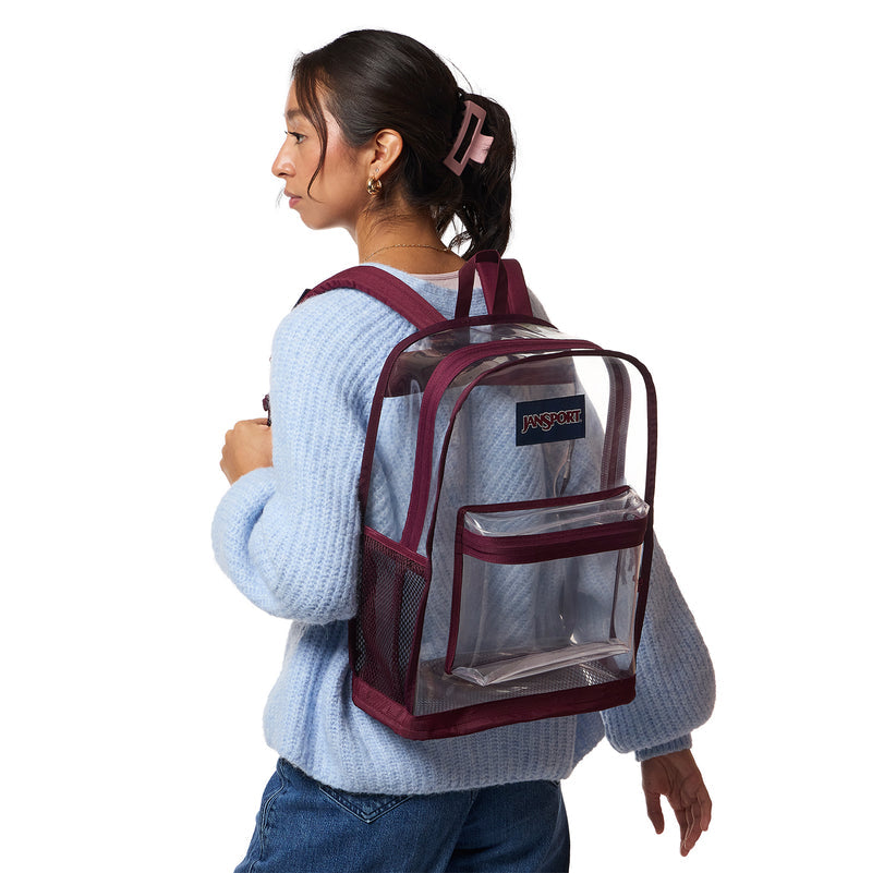 Jansport clear backpack with maroon trim, side mesh, and adjustable straps on model