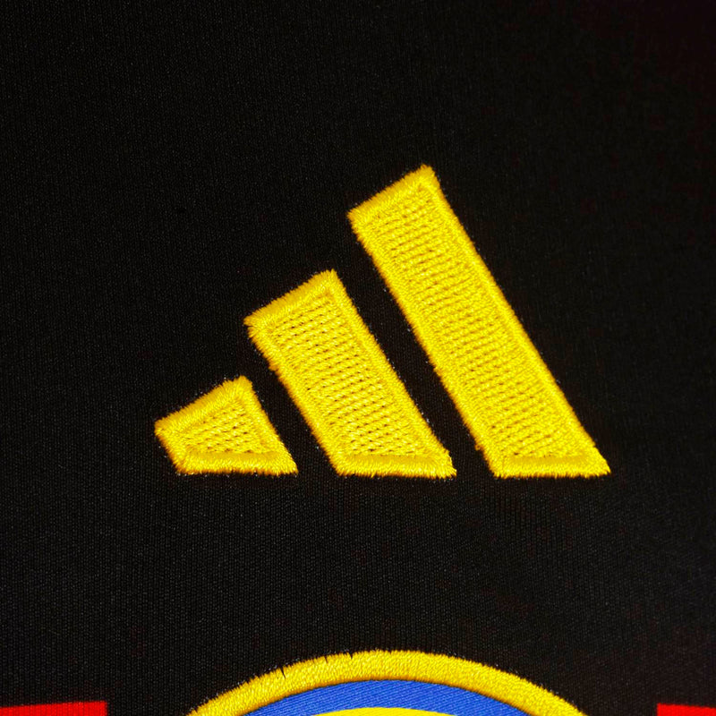 Adidas three-stripe logo on black jersey fabric