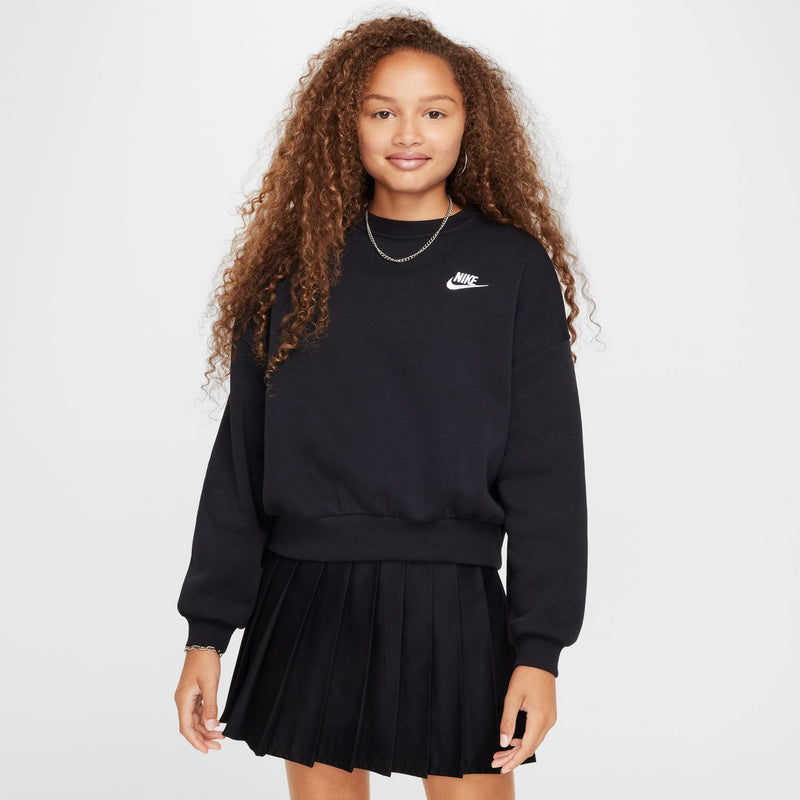 Youth black crewneck sweatshirt with long sleeves and Nike Swoosh logo on chest