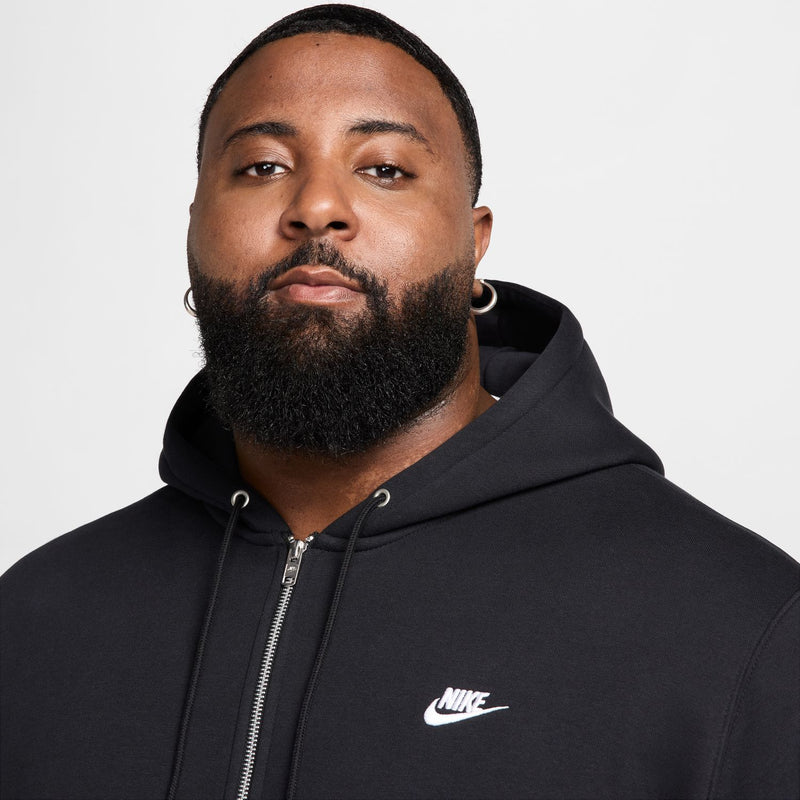 Black zip-front fleece hoodie hood with drawstrings and Nike logo on chest