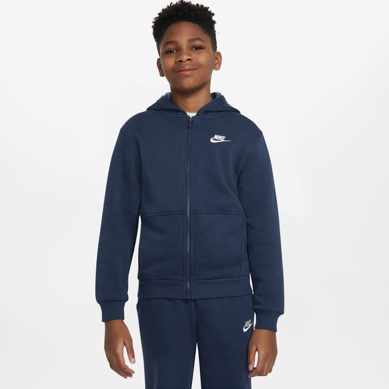 Youth navy zip-up fleece hoodie with hood and Nike logo, centered front view.