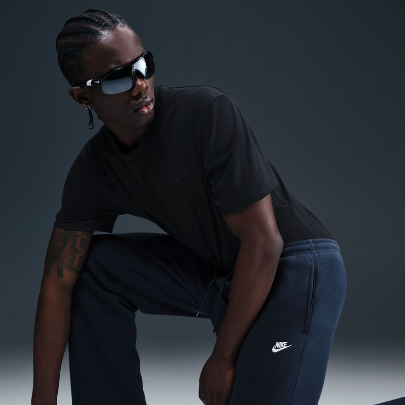 Mens dark blue open-hem fleece pants with drawstring waist and side seams
