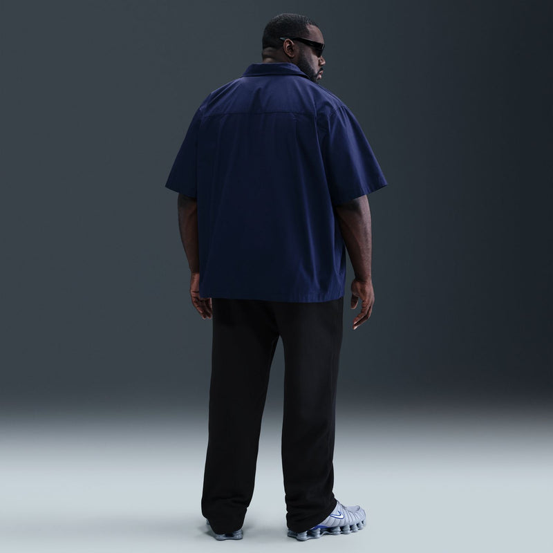Men's black fleece open-hem pants, back view with open hem cuffs