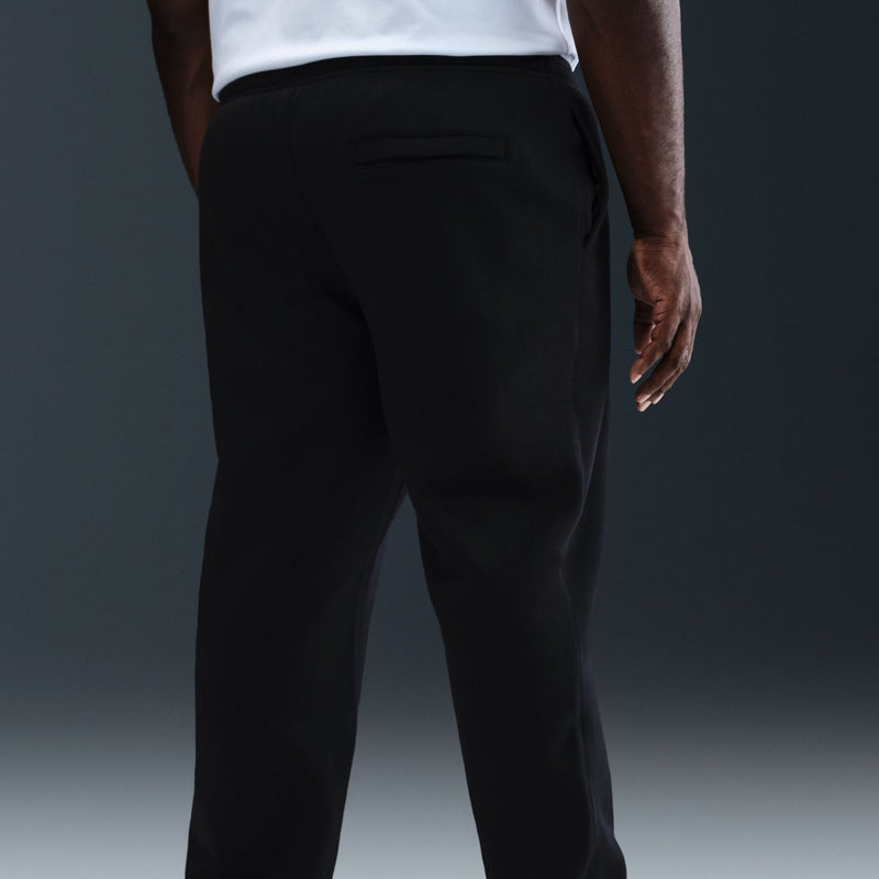 Men's black fleece pants with back yoke seam and open hem cuff