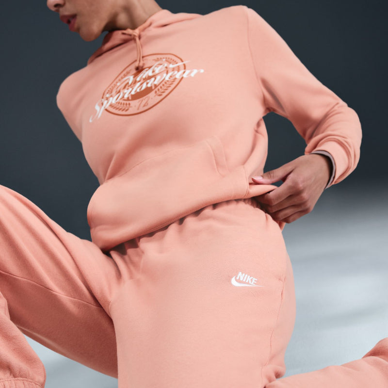 Women’s rose gold fleece sweatpants with side logo and front pocket opening