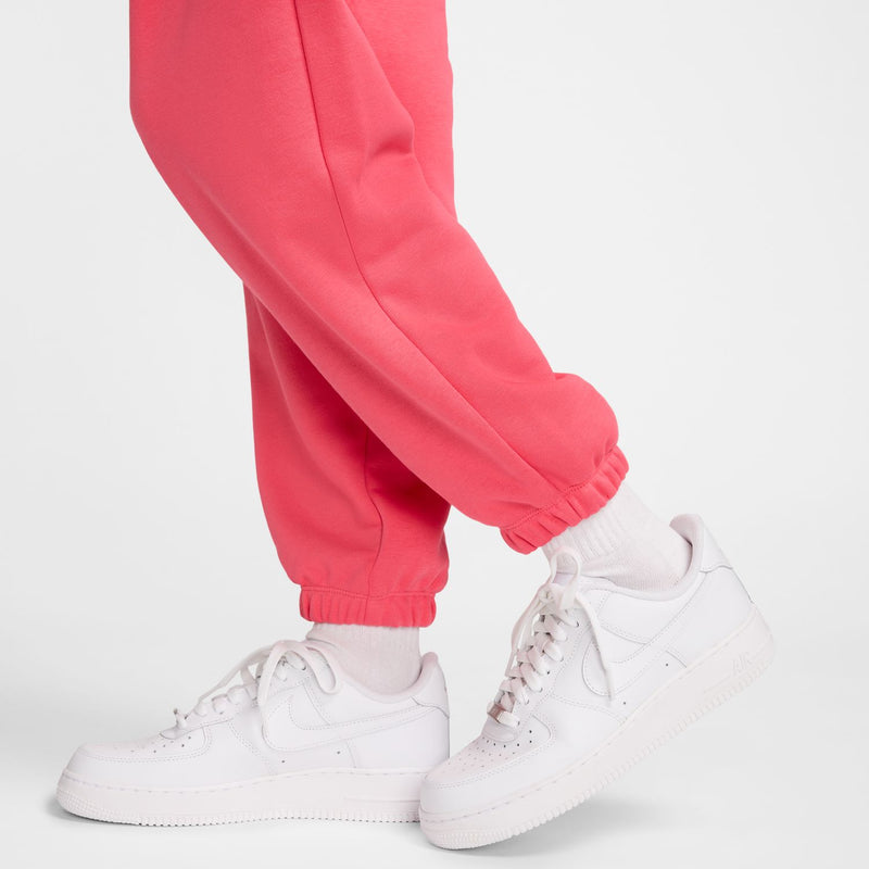 Pink fleece jogger pants with gathered ankle cuffs
