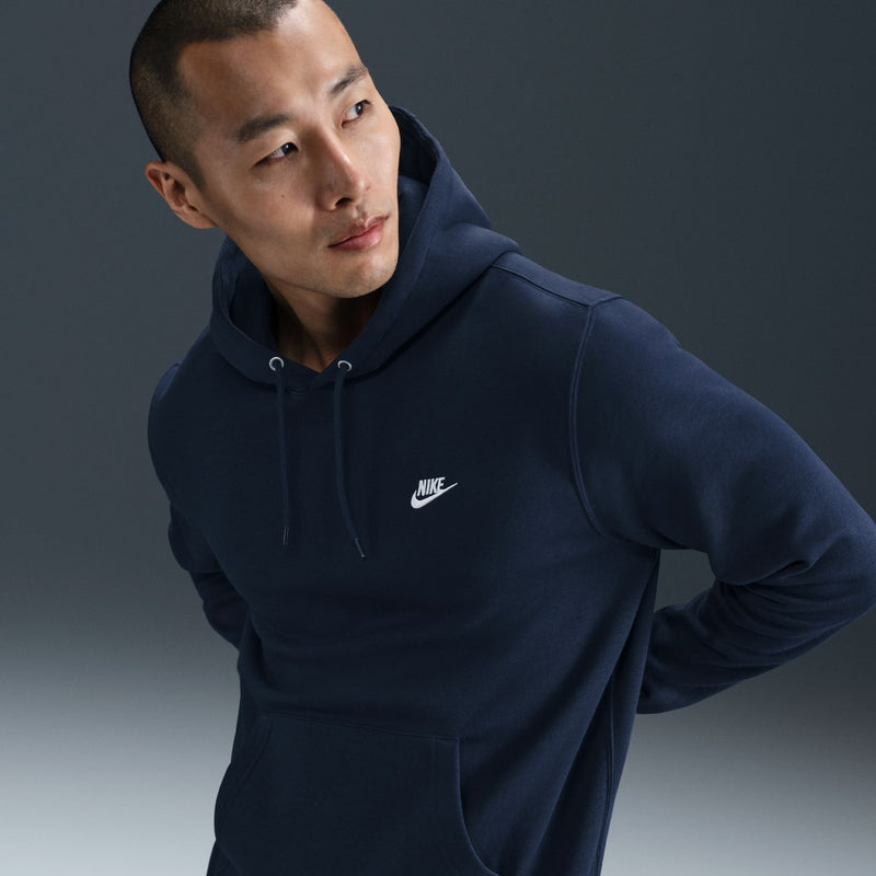 Men's obsidian fleece pullover hoodie, close view of hood and Nike logo