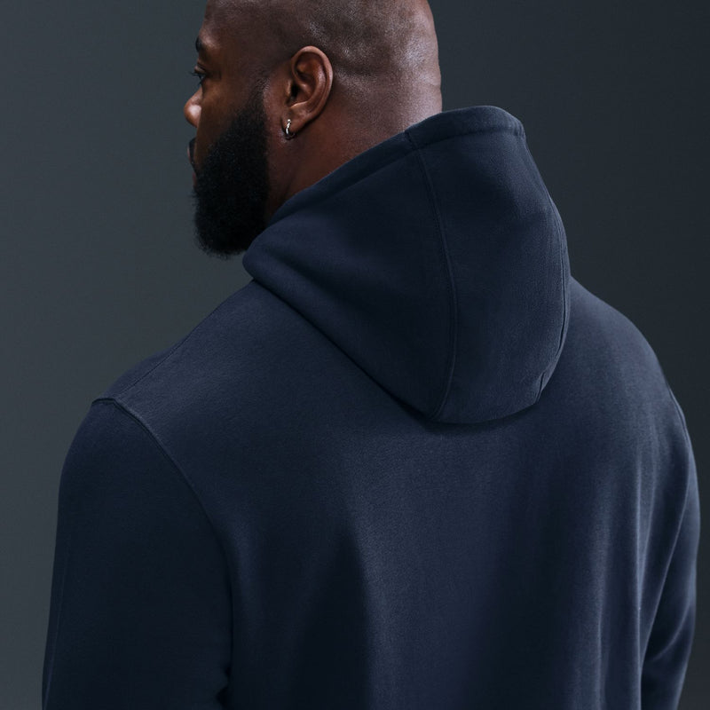 Men's obsidian fleece pullover hoodie, back/shoulder view with hood