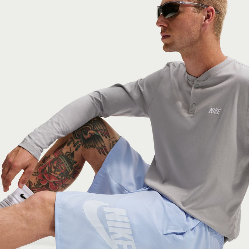 Men's light blue swim shorts, drawstring waist with side logo detail